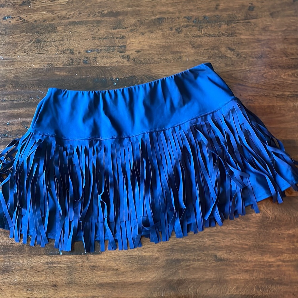 Ladies tennis skirt with built in shorts. 13” length.